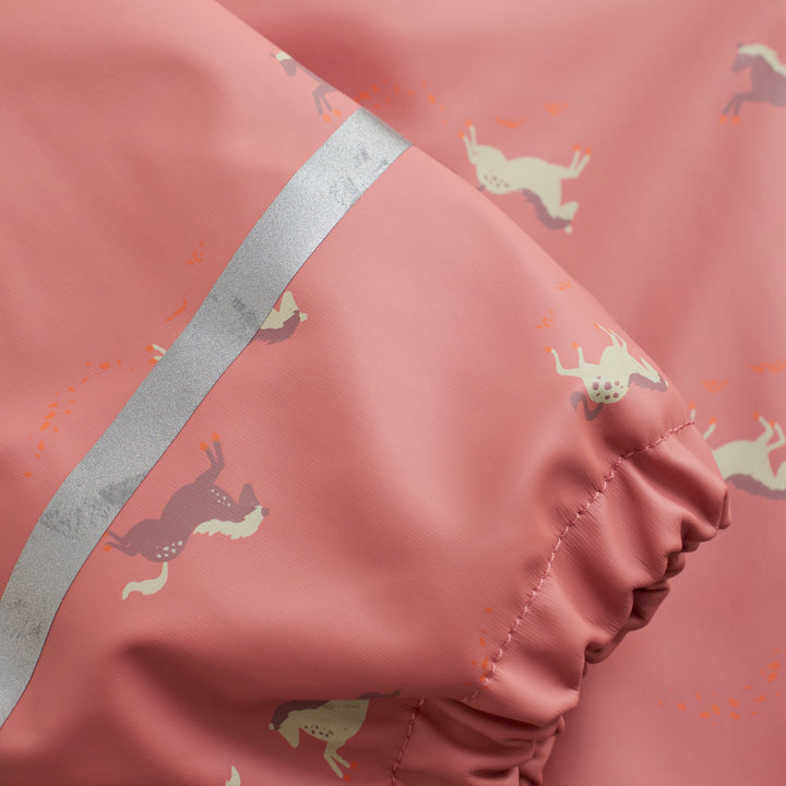 Regndress med hester – Ferskenrosa